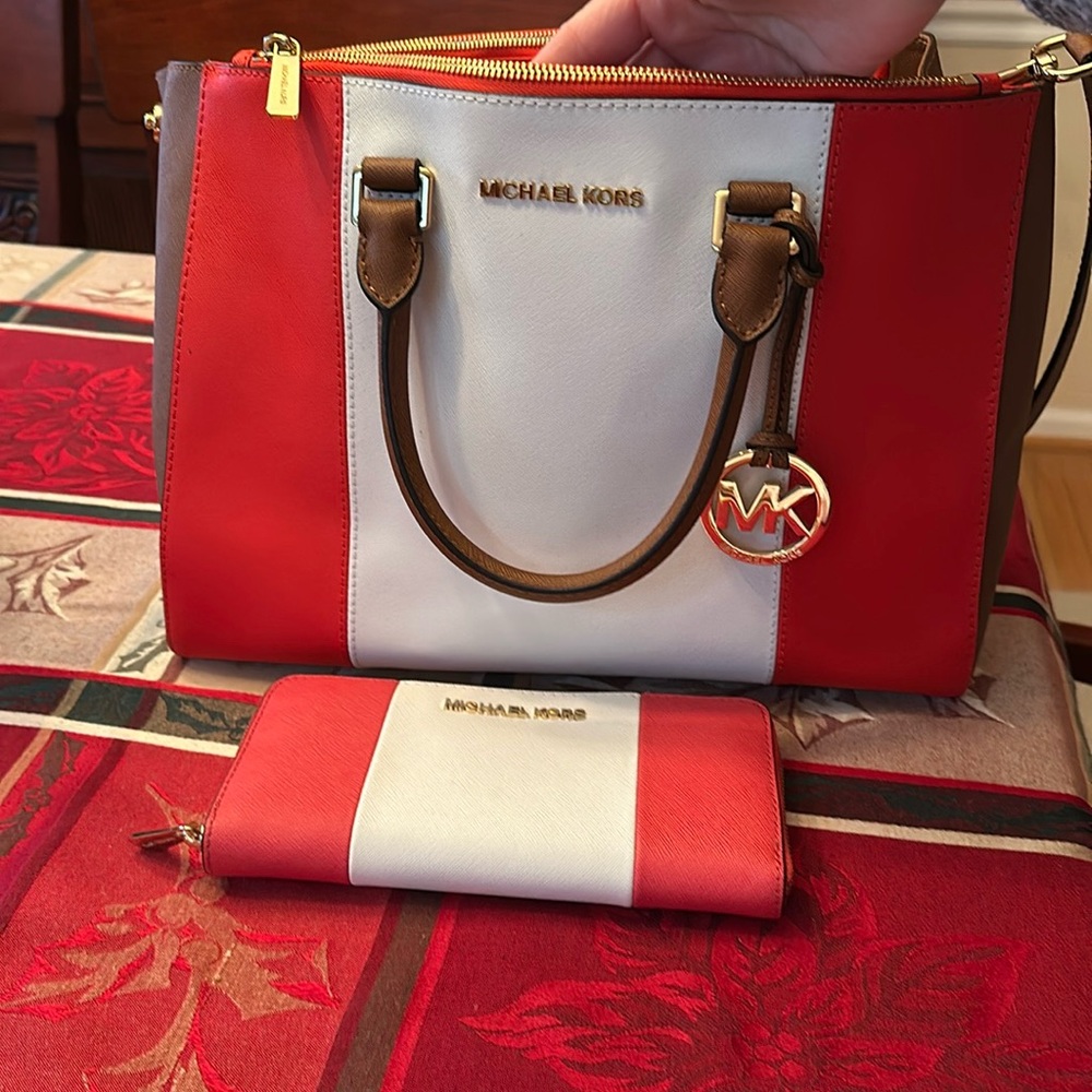 MK red white and tan handbag with matching wallet. Like new